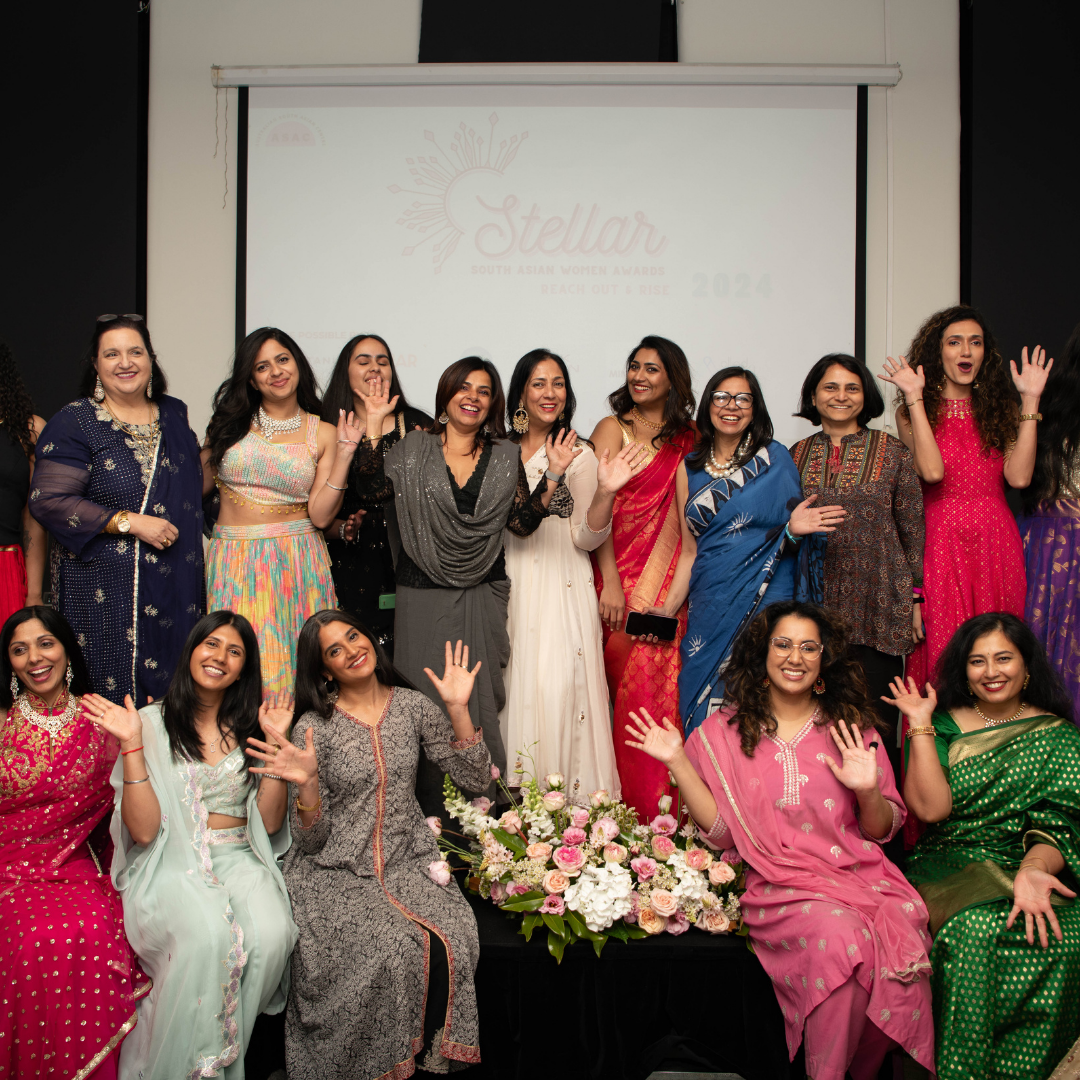 Women in vibrant South Asian attire posing together and celebrating at the 2024 Stellar Awards event.